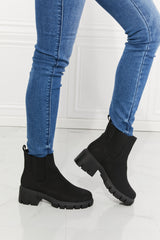 Chelsea Lug Booties in Black