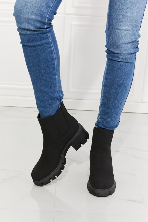 Chelsea Lug Booties in Black